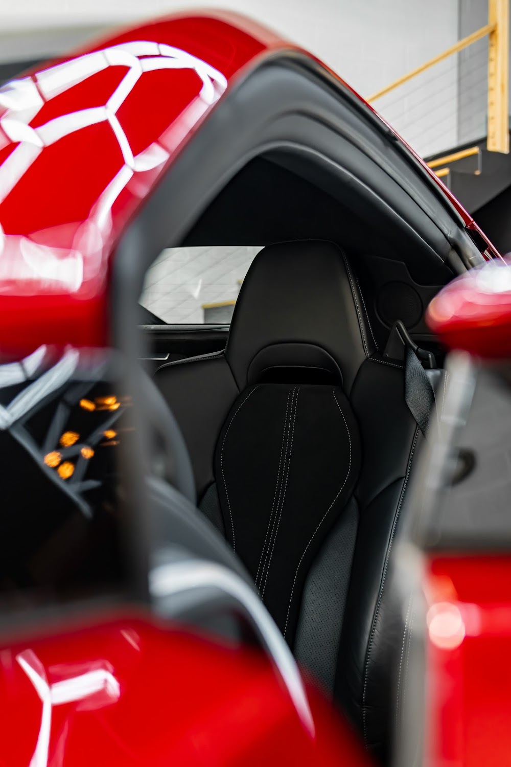 NSX seats and red bodywork through the open window