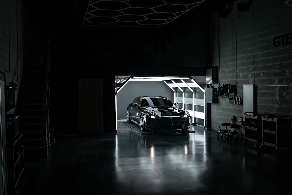 Ferrari GTC4Lusso nose under ZAutoCare's hexagon ceiling