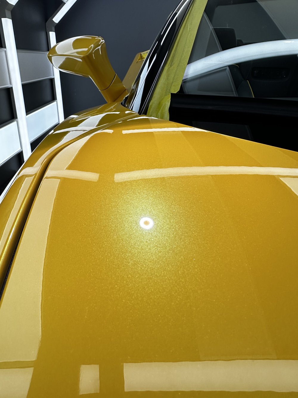 Glossy sports car after multi-stage paint correction at ZAutoCare