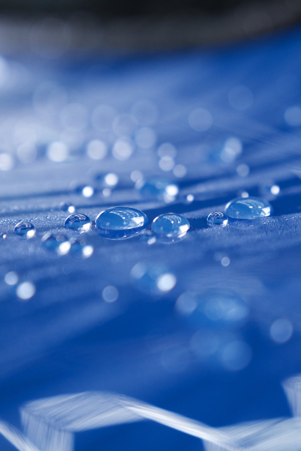 Ultra-hydrophobic water beading on blue paint protected by Gtechniq Crystal Serum Light and EXOv5