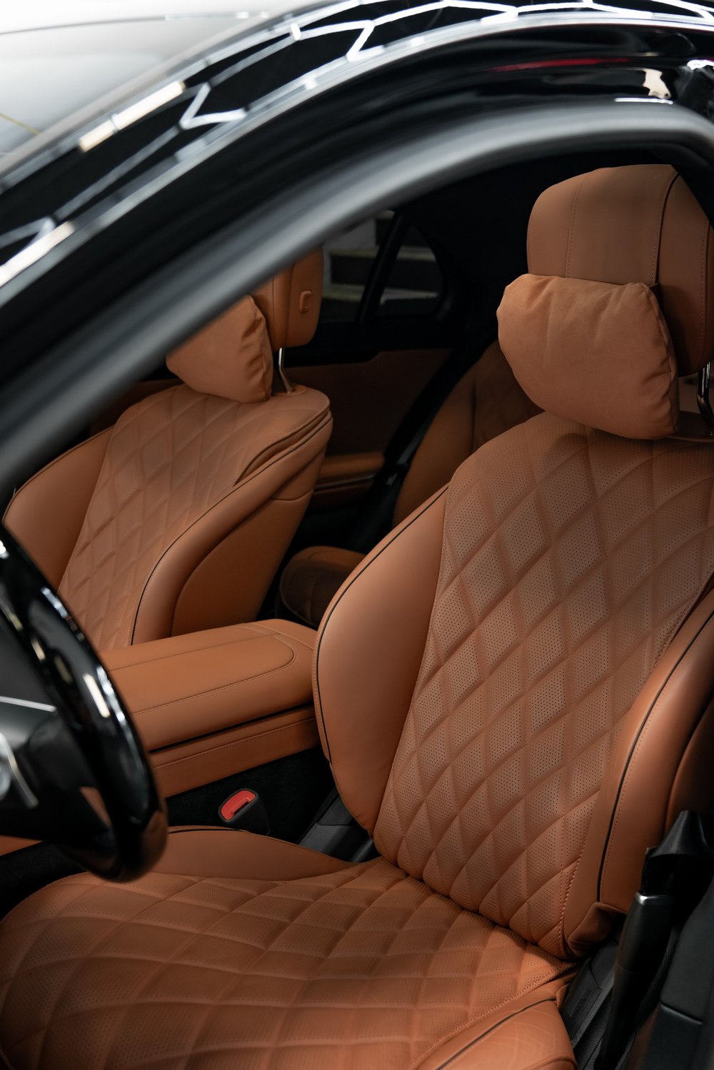 Brabus interior with quilted brown leather seats after an enhancer detail at ZAutoCare