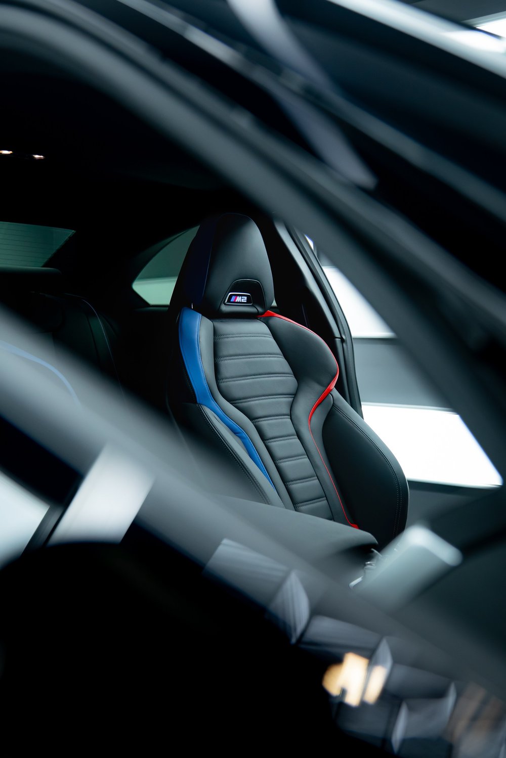 BMW M2 driver's seat in full black leather after interior detail