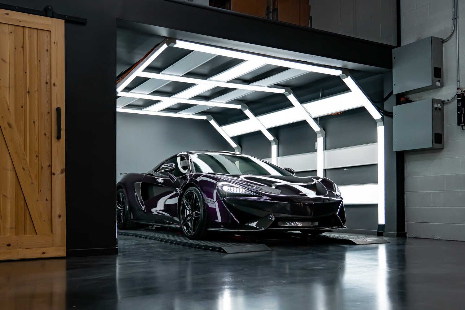  McLaren 570S curing after being polished and ceramic coated.  