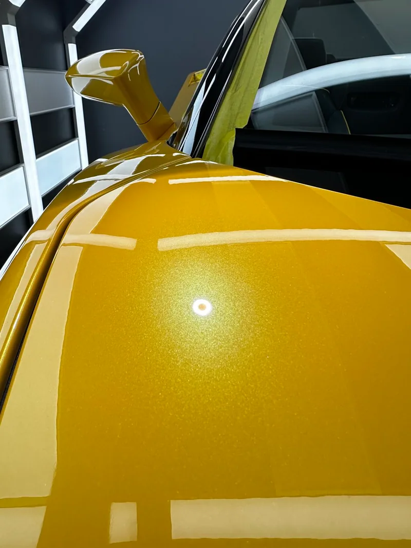 Glossy sports car after multi-stage paint correction at ZAutoCare