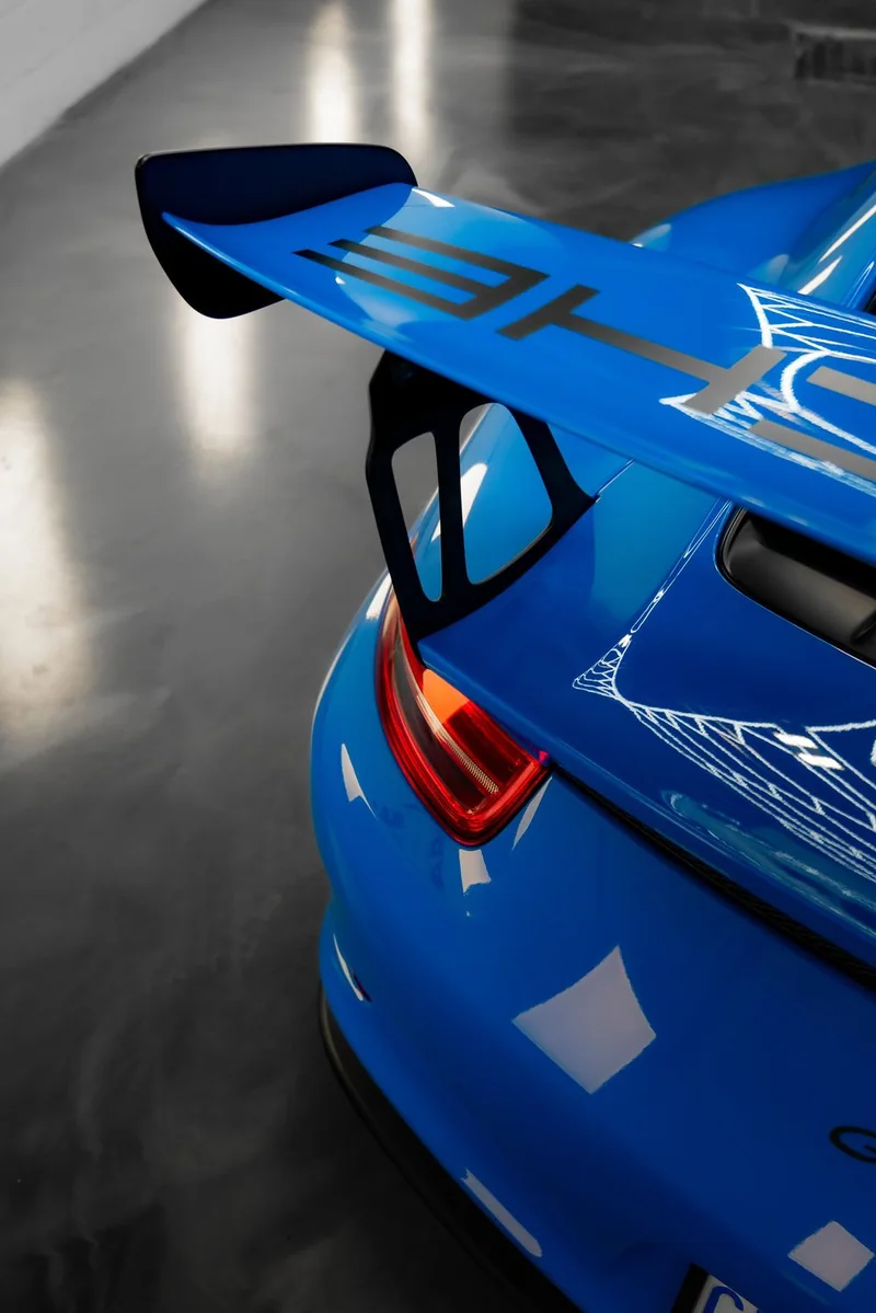 Blue Porsche 911 GT3 RS wing inside ZAutoCare